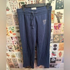 Roots size small flared track pants. Navy blue. Good condition.
